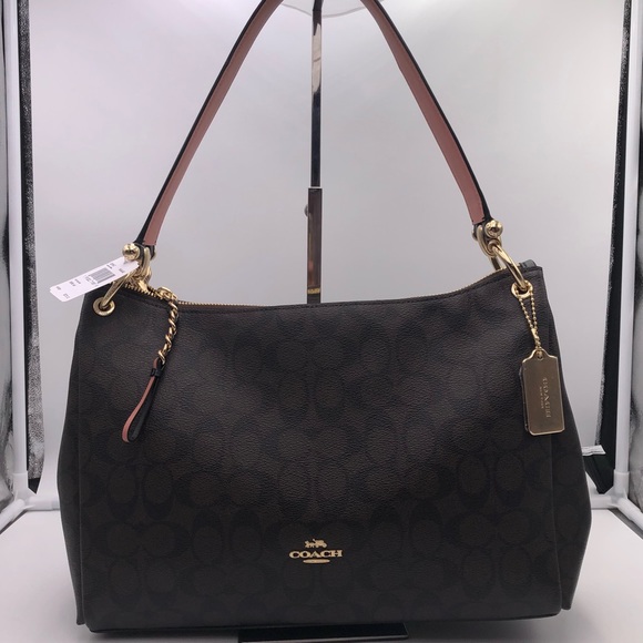 mia shoulder bag in signature canvas